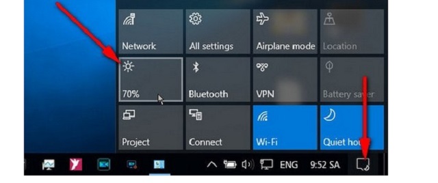 Ấn vào biểu tượng Action Center, click tiếp vào biểu tượng hình mặt trời để chinh độ sáng 