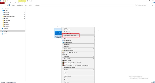 Vào Download => Chọn ảnh tải về => Kích chuột phải chọn set as desktop background